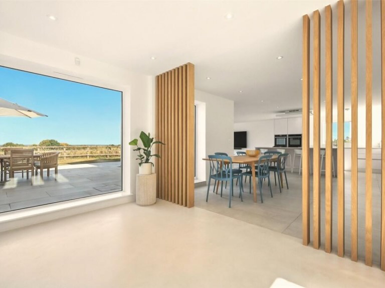 Dining area with wooden slatted dividers